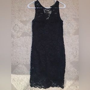 Black, form fitting, lacey dress. Worn once